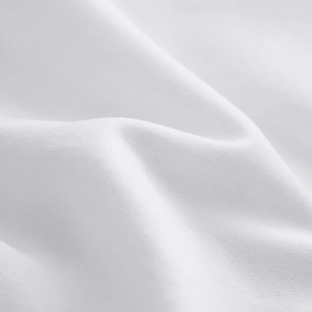 Close-up of white fabric with subtle texture